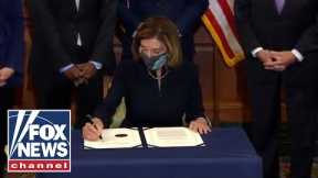 Live: House Democrats hold photo op after impeachment vote