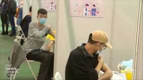 China's Covid vaccine push includes free food and retail items