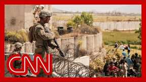 'That was a newborn baby': CNN reporter reveals dire situation at airport