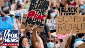 Some cities reconsider police budgets despite crime surge across the nation
