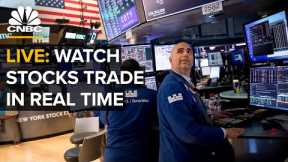 LIVE: Watch stocks trade in real time as surging commodity prices cooled off — 3/9/22