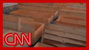 Makeshift coffins stand ready for the dead in Chernihiv