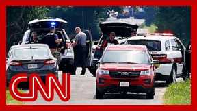 Armed man who tried to breach a FBI field office killed in standoff with police