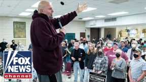 John Fetterman campaigns in brief appearance weeks after stroke