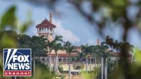 What has the media taken from DOJ's Mar-a-Lago photo?
