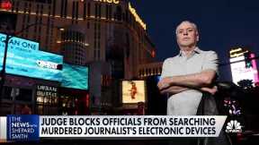 Judge blocks officials from searching murdered journalist's electronic devices