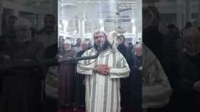Cat jumps on sheikh leading prayer. See his reaction