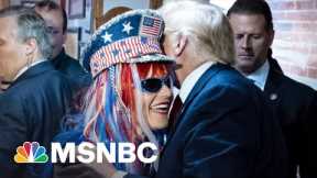 Trump embraces woman convicted in Jan. 6 case