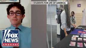 College student details professor's attack on anti-abortion display