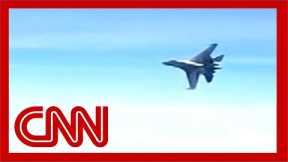 Chinese fighter jet cut so close to US spy plane it caused turbulence in cockpit