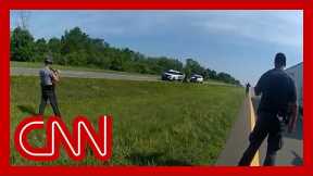 An unarmed Black man was attacked by a police dog despite surrendering with his hands in the air