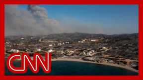 Thousands evacuated as fire approaches popular resort area