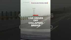 Car drives off collapsed bridge