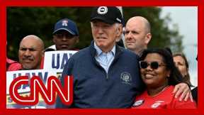 In historic move, Biden joins autoworkers’ picket line