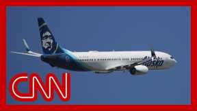 An off-duty pilot tried to take control of Alaska Airlines flight