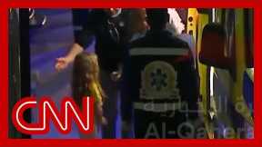 Young girl exits ambulance at Rafah crossing amid hostage release