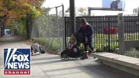 CRISIS IN NEW YORK: Mom must navigate through drug users to get child to school