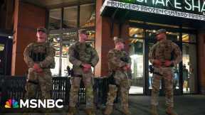 National Guard troops now carrying weapons in D.C.