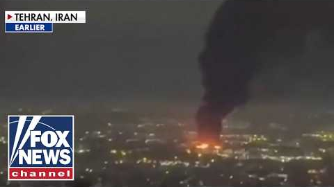 OVERNIGHT: Tehran up in FLAMES as Israel, Iran trade missile strikes