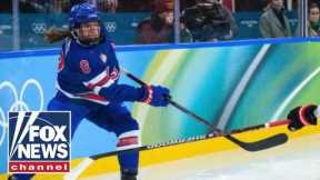 Brothers go viral cheering on Olympic star sister