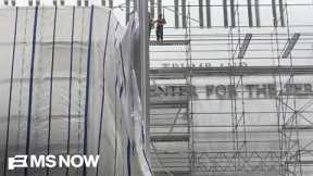 LIVE: Trump name removal from Kennedy Center being blocked by tarp
